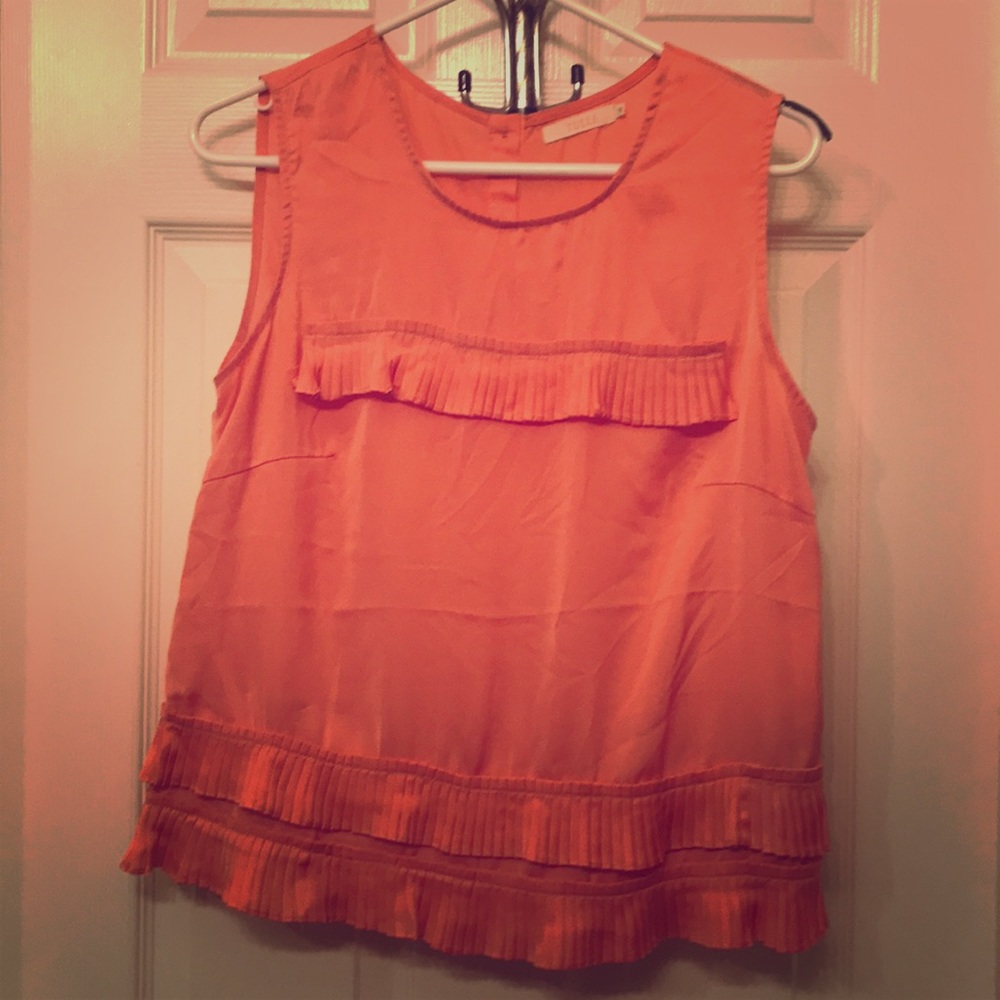 Tulle coral colored button back shell